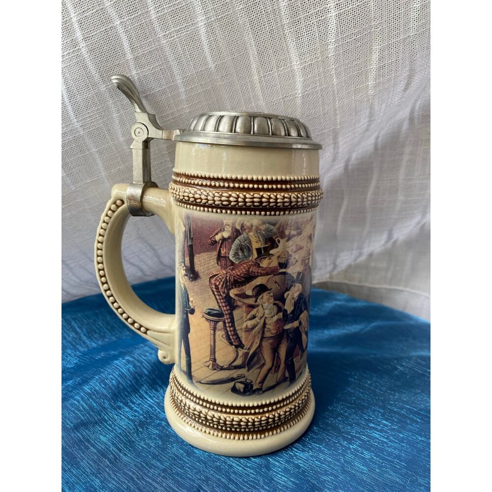 1999 Paul Sebastian Fine Fragrance Co. beer stein features a detailed in Germany